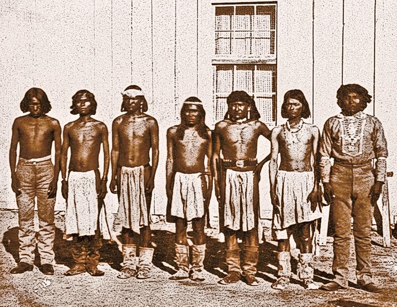 Mickey Free at Camp VerdeWhen Apaches abducted Felix Ward in 1860, they wore loincloths and moccasins. Seventeen years later, at the Camp Verde reservation in Arizona, white man’s clothing was just coming into vogue. Ward stands among them, second from right; he had joined the U.S. Army as a scout in 1872 and would even attempt to track down the renegade Apache Kid.– Courtesy Sharlot Hall Museum –