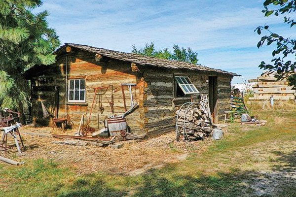 888-cabin-of-Robert-B.-Anderso_first-black-homesteader