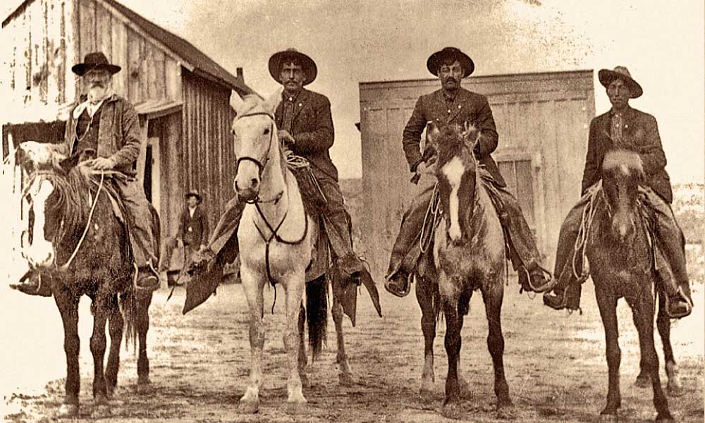Wickenburg’s Hispanic Vaqueros Photographed in the 1890s in downtown Wickenburg, Arizona, these pioneer Hispanic vaqueros are named (from left): Jesus Olea, Francisco Macias, Juan Grijalva, Clemente Macias. Francisco is the great-grandfather of Julia Macias Brooks, the executive director of Wickenburg’s Chamber of Commerce and a fifth-generation descendant who authored a book about the town’s pioneer Hispanic families. – Courtesy Wickenburg Chamber of Commerce –