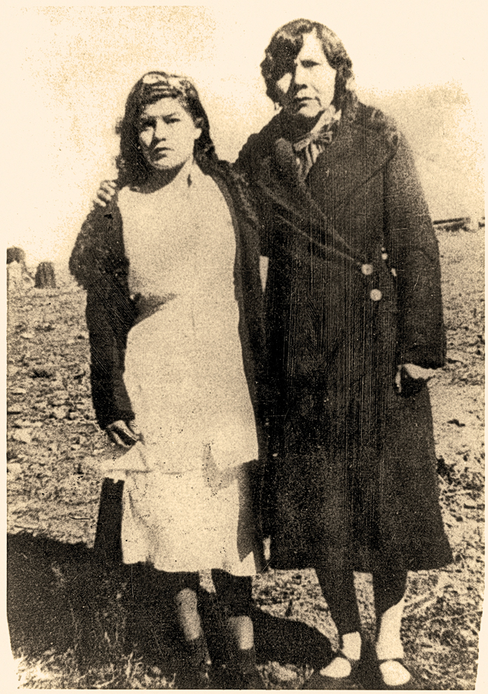Lupe stands with her Mexican confidant, Soco, circa 1936, proving enemies could become friends. Lupe had held a lifelong hatred of Mexicans who she felt had preyed on the Apaches. – Courtesy Fimbres Family, Lynda A. Sánchez Collection –