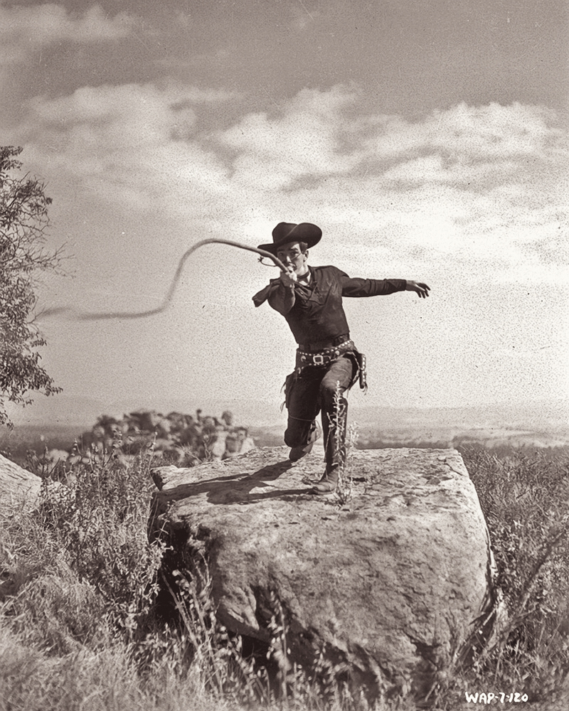 Veteran cowboy actor Lash LaRue cracked his bullwhip to bring down the bad guys. – Courtesy Western Adventures Productions from 1950’s King of the Bullwhip –