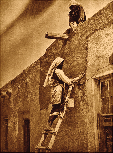 A historic New Mexico pueblo exemplifies how mudding the adobe walls (see the women in inset) is just one step to preserving a home...you also have to make each one livable. – Courtesy Ohkay Owingeh Housing Authority –