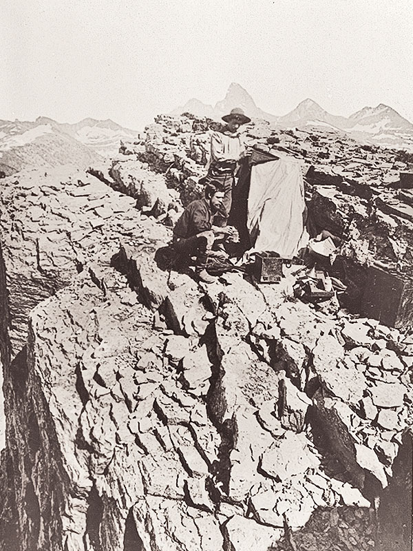 BOW-HT_William-Henry-Jackson-and-another-man-with-photographic-equipment-on-mountain-near-Yellowstone-Park-WY-1871-1878