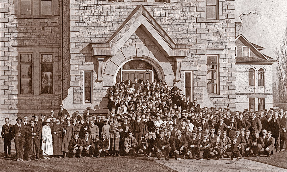 Oneida Stake Academy, shown here in the 1910s, was built in the 1890s with volunteer labor and financed by community giving—everything from donating a pig to selling a cow to cutting rocks. “Everything in the building is hand made, down to the bolts,” Necia Seamons says. “Children came here from a very large area and had to board with people in the community. It was a major commitment to get an education.” – Courtesy Oneida Stake Academy Museum and Community Center –